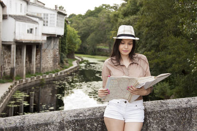 Girl with map outdoor travel