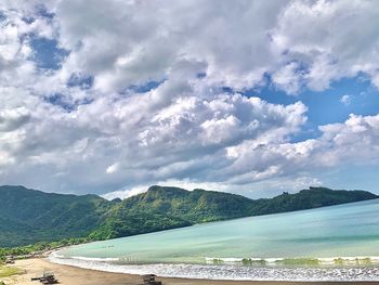 Scenic view of beach against sky