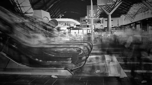 Blurred motion of train at railroad station