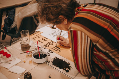 Portrait of man sitting at table