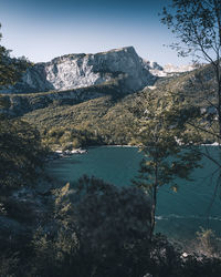 Scenic view of bay against clear sky