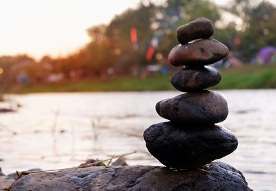 Close-up of stone stack on rock