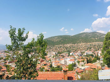 Aerial view of townscape against sky