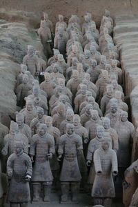Statue of buddha in row
