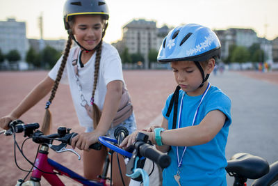 Portrait of boy riding bicycle