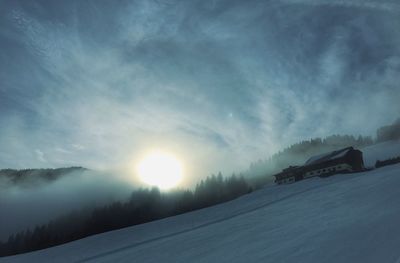 Sun shining through clouds