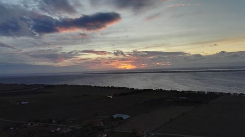 Scenic view of sea against sky at sunset