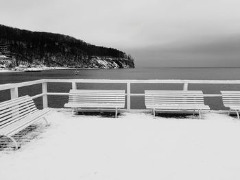 Built structure on beach against sky