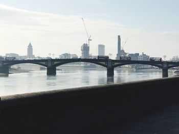 Bridge over river in city