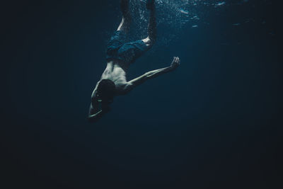 Man swimming in sea