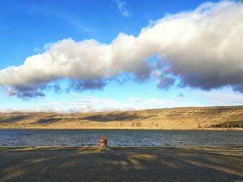 Man on beach against sky