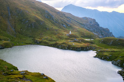 Sunrise on fagaras high mountain ridge. romanian mountain landscape with high peaks over 2200m