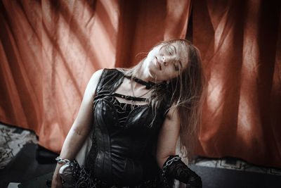 Midsection of woman with hands