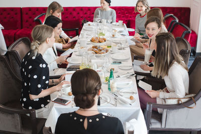 Women having meeting french lesson for adults.