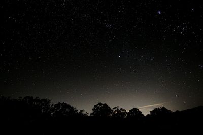 Low angle view of stars in sky at night