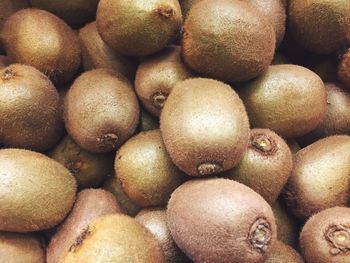 Full frame shot of kiwis at market for sale