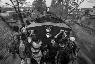 High angle view of people on train