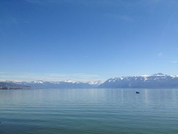 SCENIC VIEW OF SEA AND MOUNTAINS