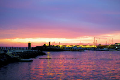 Scenic view of sea against sky at sunset