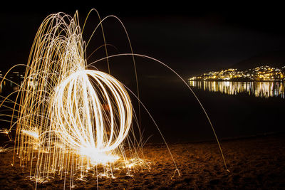 Firework display at night