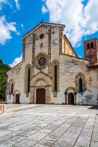 Facade of historic building against sky