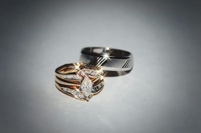 Close-up of ring over white background