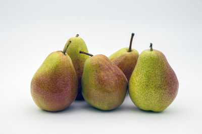 Close-up of apples on white background