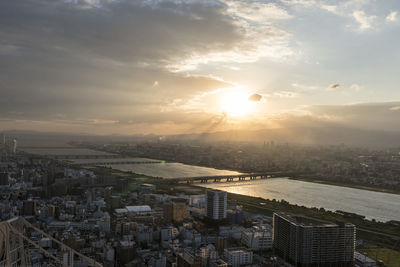 High angle view of river along cityscape