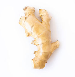 High angle view of bread against white background