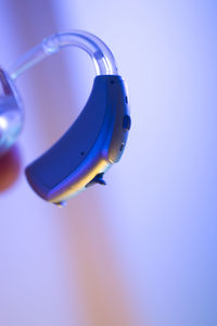 Close-up of toy car against blue background