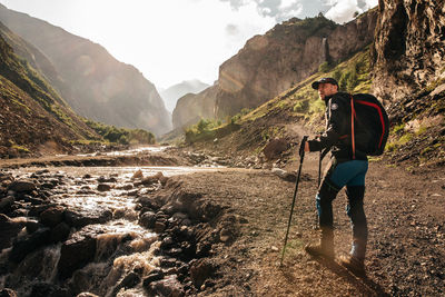 Rear view of man on mountains