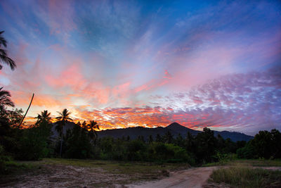 Scenic view of dramatic sky during sunset