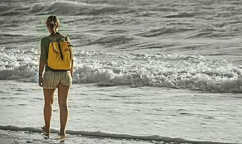 People standing in sea