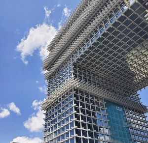 Low angle view of modern building against sky