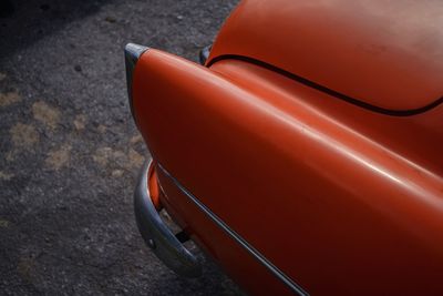 High angle view of red car on street