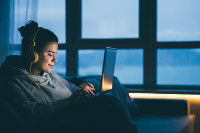 Young woman using mobile phone