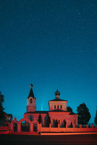 Building against blue sky at night