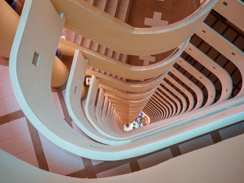 Directly below shot of spiral staircase of building