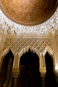 Low angle view of ornate ceiling in historic building