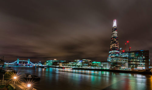 Illuminated buildings in city at night