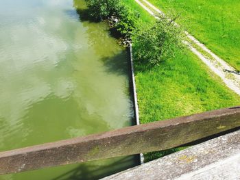 High angle view of railing by river