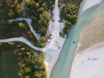 High angle view of road amidst trees