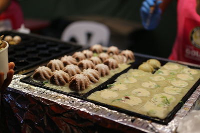 Close-up of person preparing food