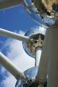 Low angle view of tower against blue sky