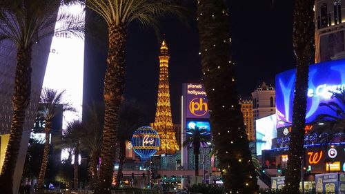 Low angle view of illuminated building at night