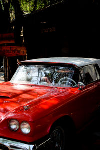 Red car at night