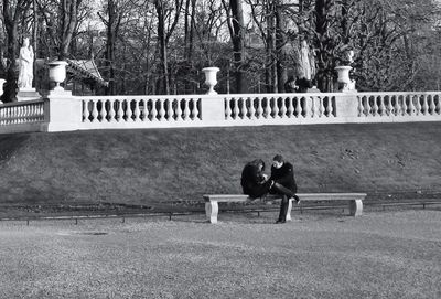 Woman sitting in park