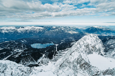 Scenic view of snowcapped mountains against sky