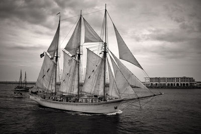 Sailboat on sea against sky