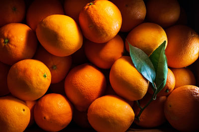 Full frame shot of oranges in market